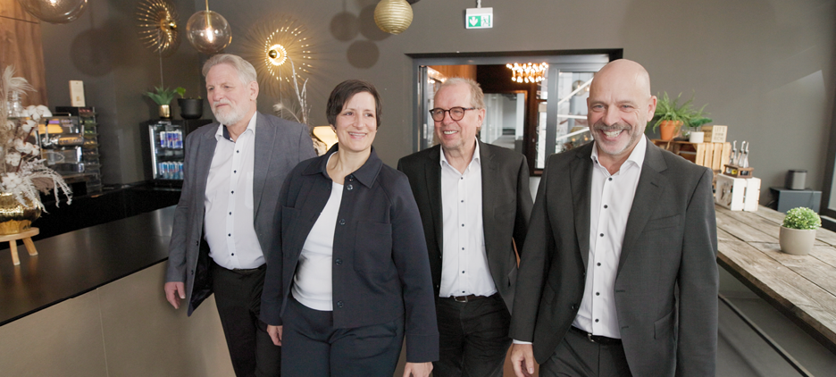 4 Passionals im Bürogang v.l.n.r Werner Lessmann, Tanja Born , Jürgen Wöst, Christof S. Seltmann 